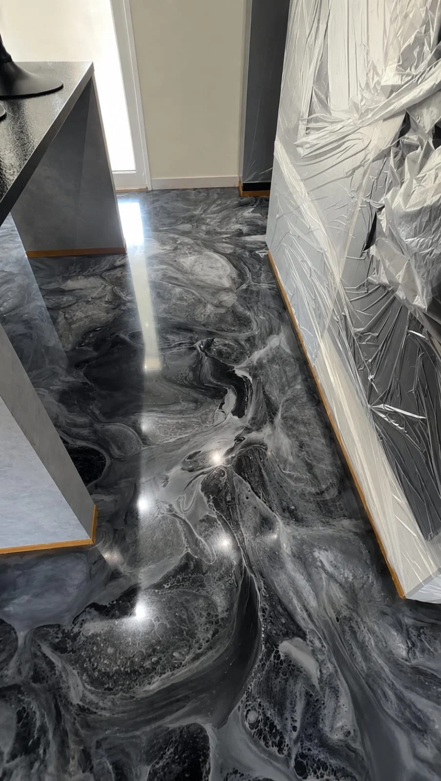 Commercial epoxy flooring installation for showroom in Sushant Golf City Lucknow